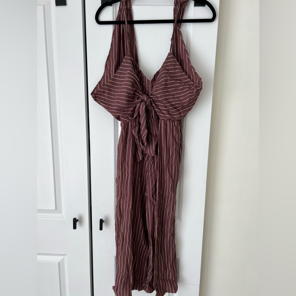 Maroon striped jumpsuit with tie bow in front